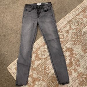 Washed out gray jeans